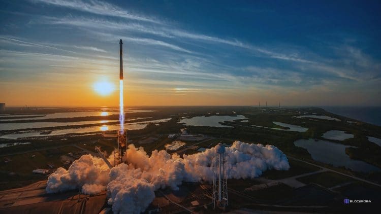 SpaceX Falcon 9 rocket launching Crew-10 mission at sunset with smoke and flames