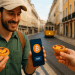 Digital nomad in Lisbon buying a pastel de nata using Bitcoin on his phone with a yellow tram in the background
