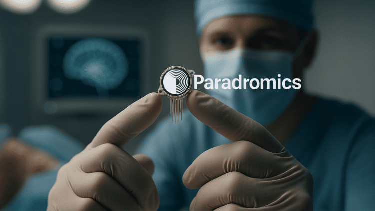Surgeon holding a high-resolution brain implant device with microelectrodes during neural interface testing.