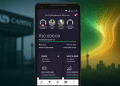 Smartphone displaying OM Bank app with Capitec branch blurred in the background and glowing green-gold digital waves over a South African city skyline.