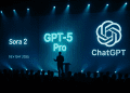 OpenAI Dev Day 2025 stage with audience watching the unveiling of GPT-5 Pro, Sora 2, and ChatGPT under blue lighting