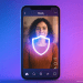 Smartphone showing a protected Reels video with a glowing shield icon, symbolizing Meta’s new Content Protection tool