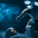 Robotic surgical arm performing a remote transatlantic stroke procedure with real-time AI data visualized over a world map in a modern operating room.