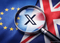 Magnifying glass highlighting the X social media platform logo against the European Union and United Kingdom flags, symbolising regulatory scrutiny over Grok AI deepfake content.