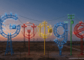 A minimalist editorial rendering of the Google G logo constructed from electrical power grid infrastructure and high-voltage lines at sunset.