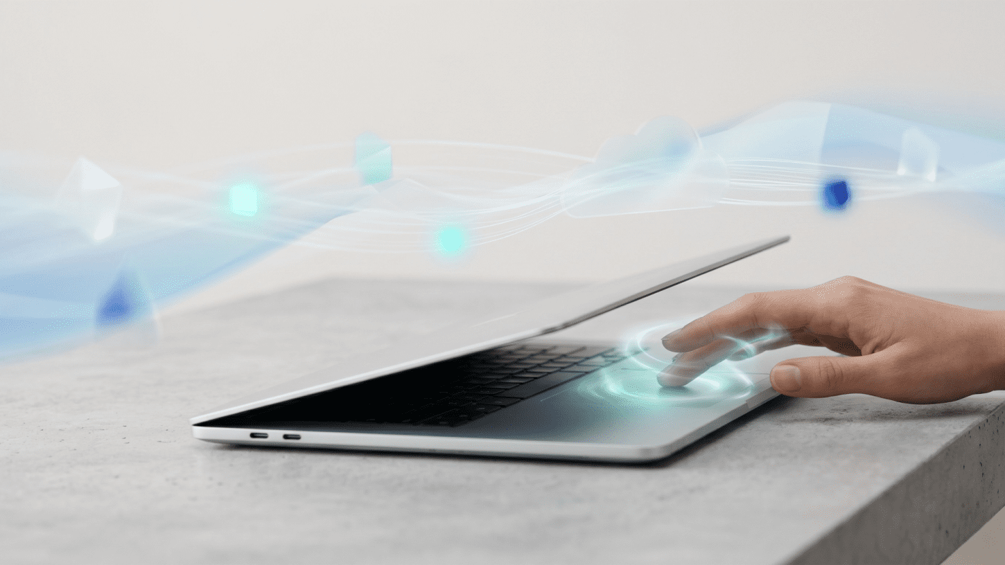 A hand interacts with a laptop trackpad amidst glowing digital waves and cloud icons, representing Googlebook's Gemini AI integration.