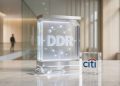 A minimalistic 3D glass and metallic display unit showing a digital DDR node network next to an institutional Citi logo block on a marble desk, representing digital depositary receipts.