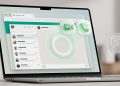 Sleek laptop displaying WhatsApp Web interface with floating 3D voice and video calling icons, illustrating browser-based calling.